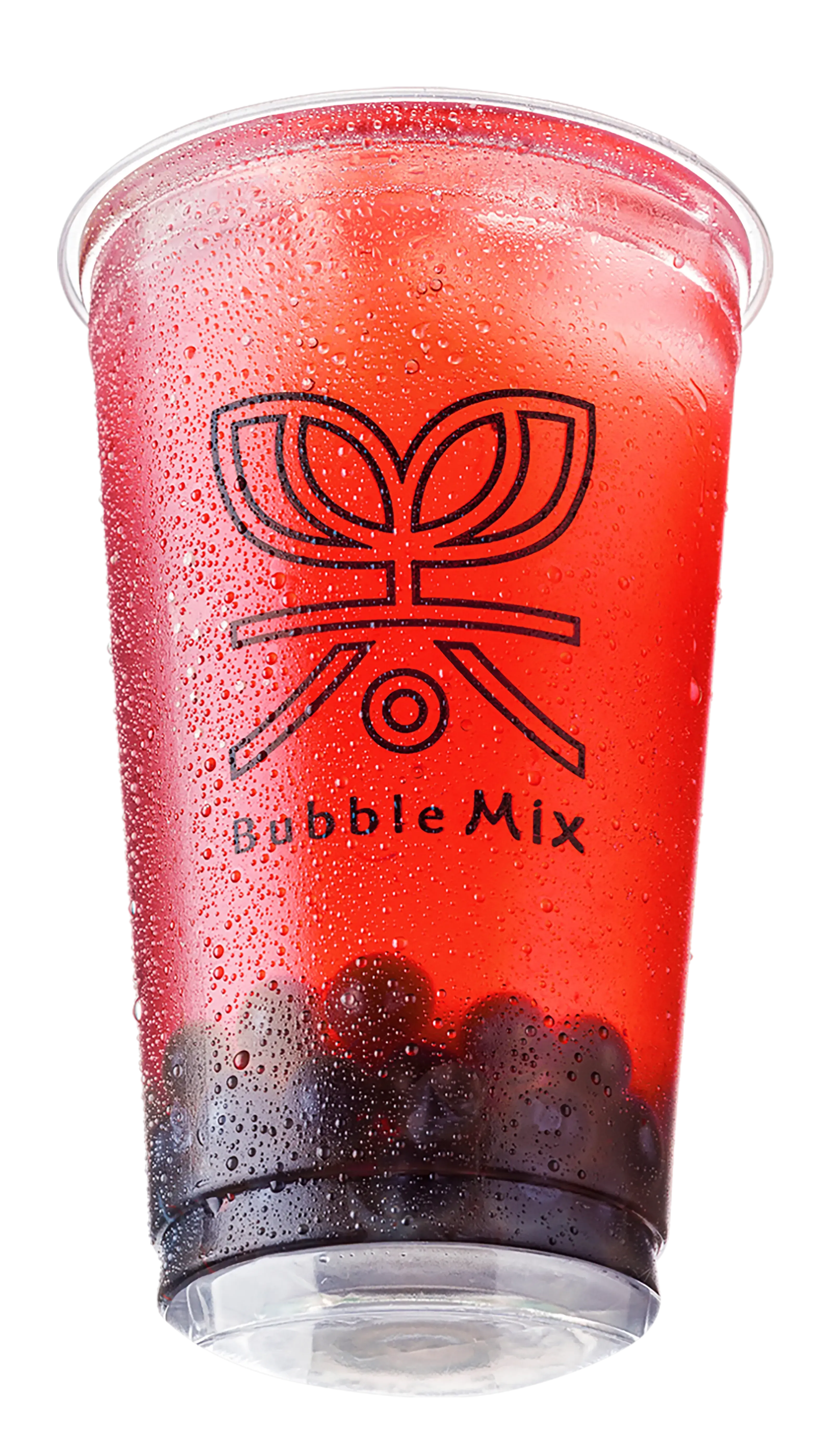 Copo de bubble tea com bolinhas coloridas no fundo e canudo largo