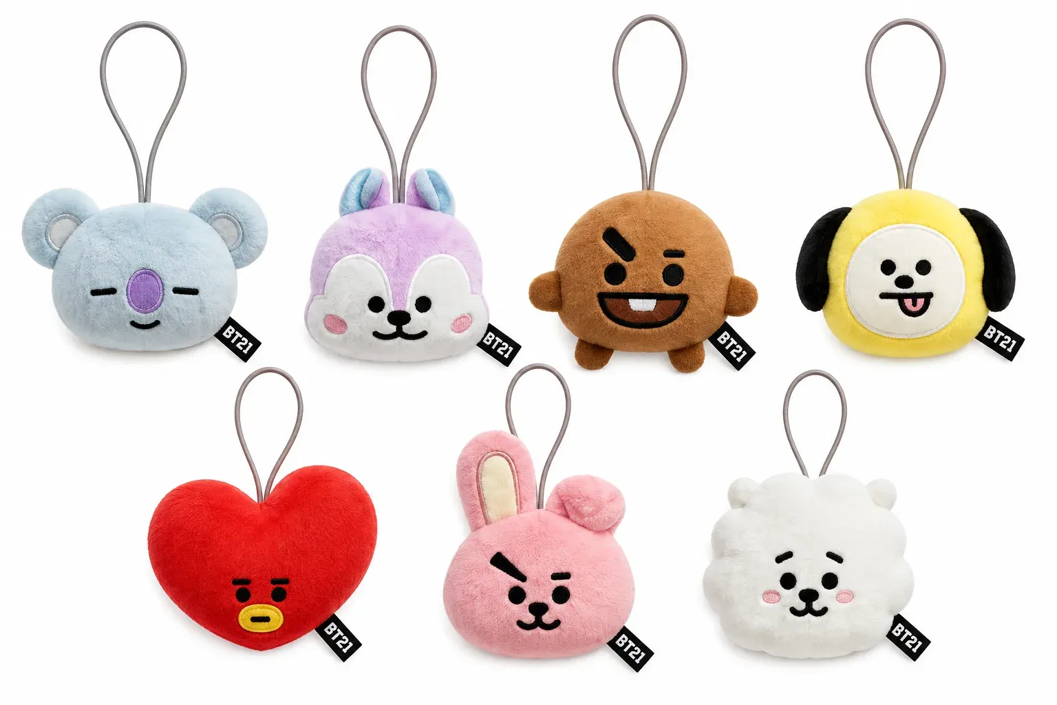Miniaturas colecionáveis do BT21 do MiniMark enfileiradas em fundo branco