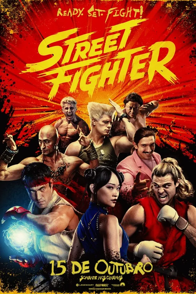 Pôster oficial de Street Fighter com os lutadores do filme sobre fundo vermelho e estreia anunciada para 15 de outubro